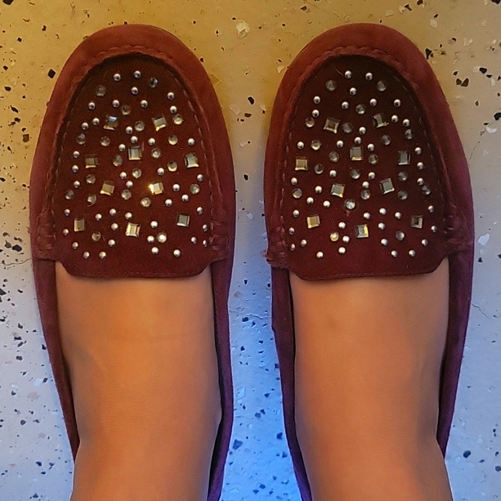 Vionic size 9 loafers. They are purple colored and leather.